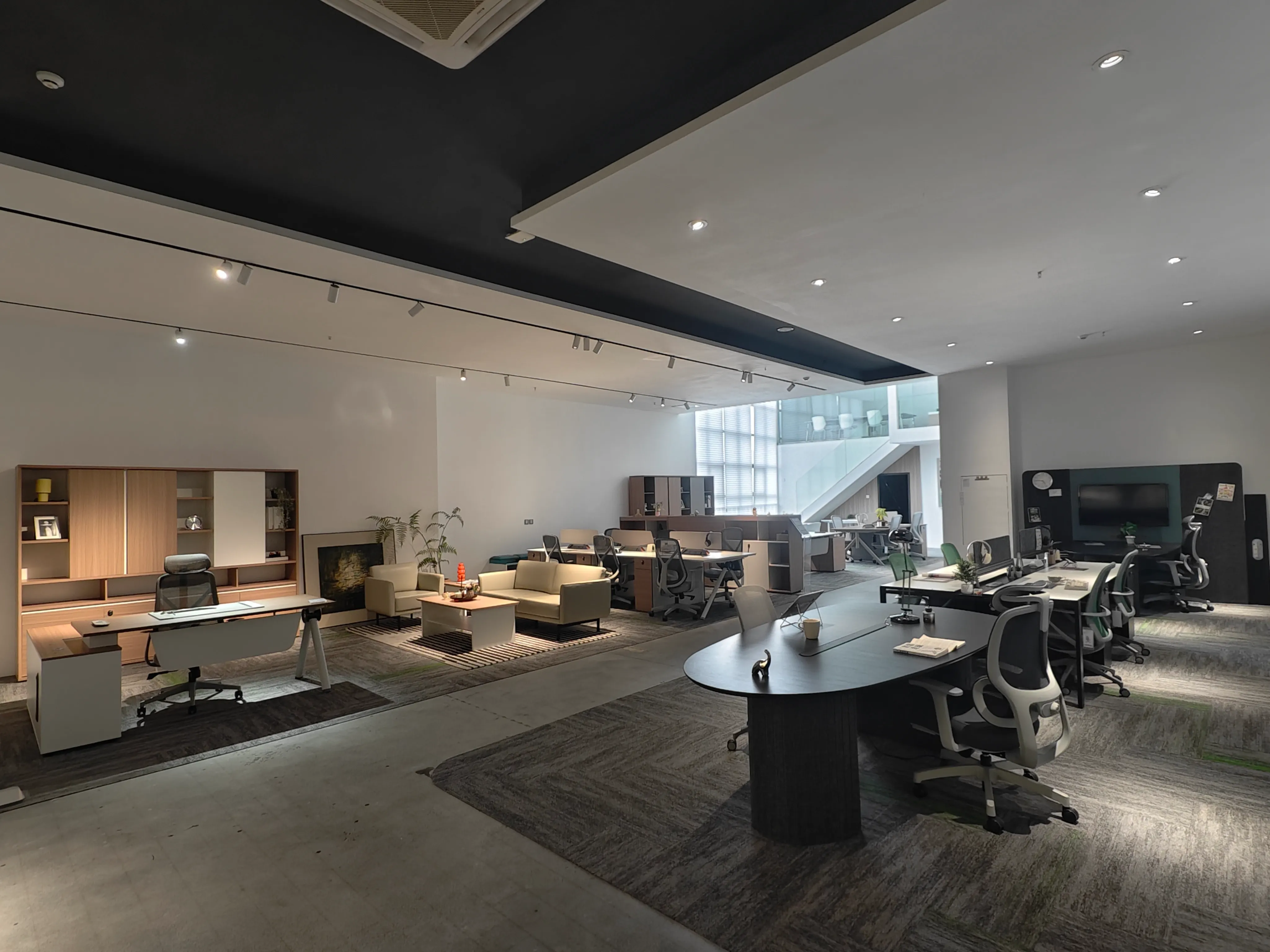 Modern office furniture showroom displaying complete workspace solutions