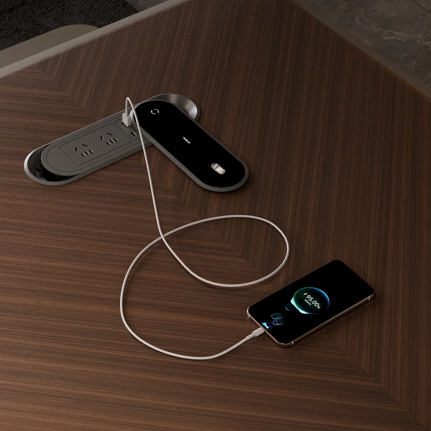 Hidden built-in power outlet on a modern executive office desk