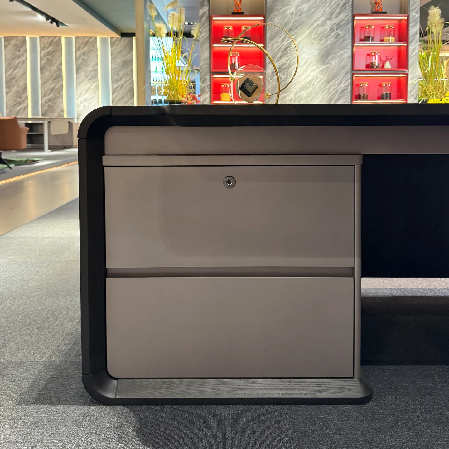 Built-in drawer storage detail on modern executive office desk