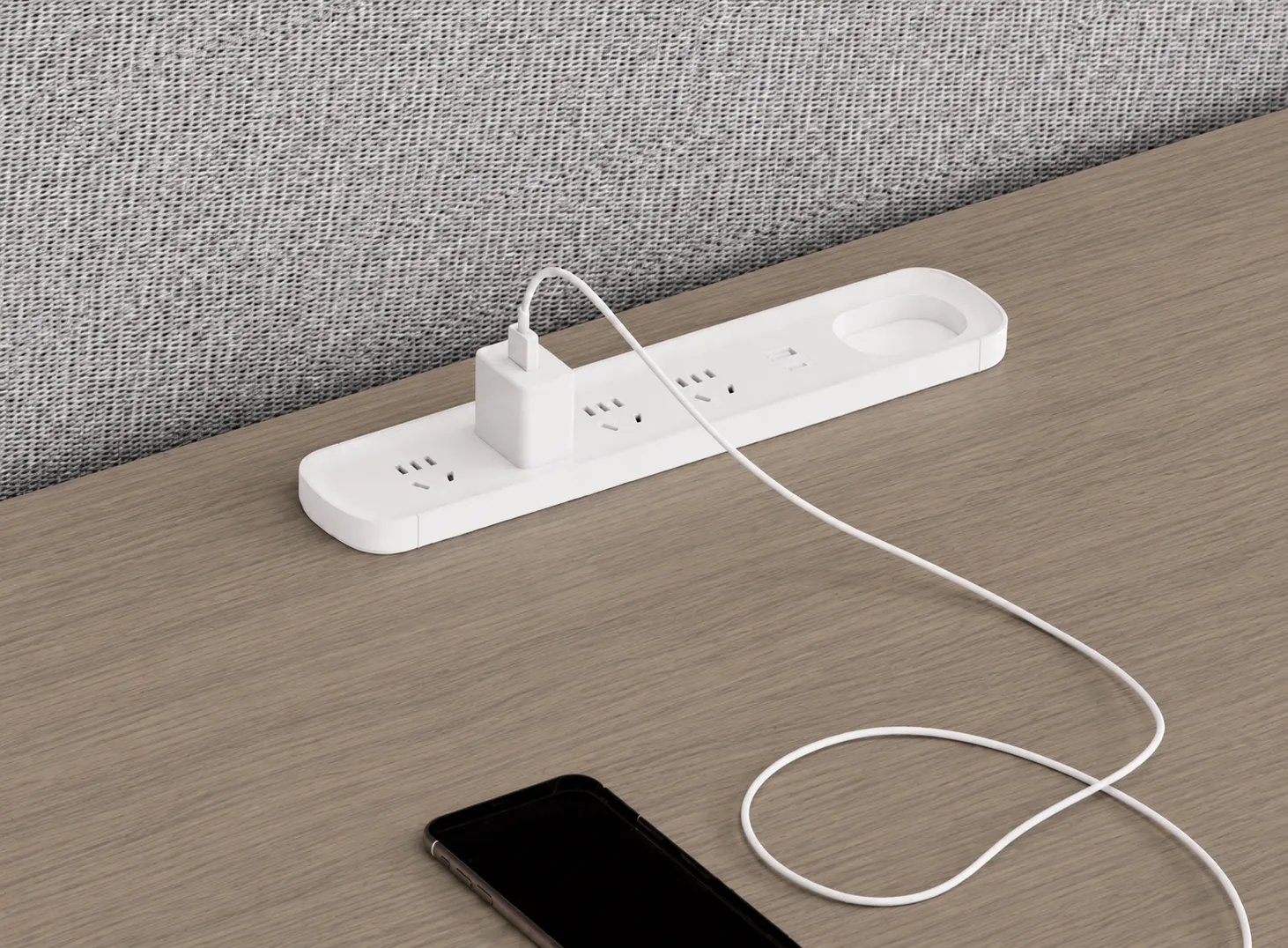 Integrated power access on height adjustable workstation desk for charging office devices