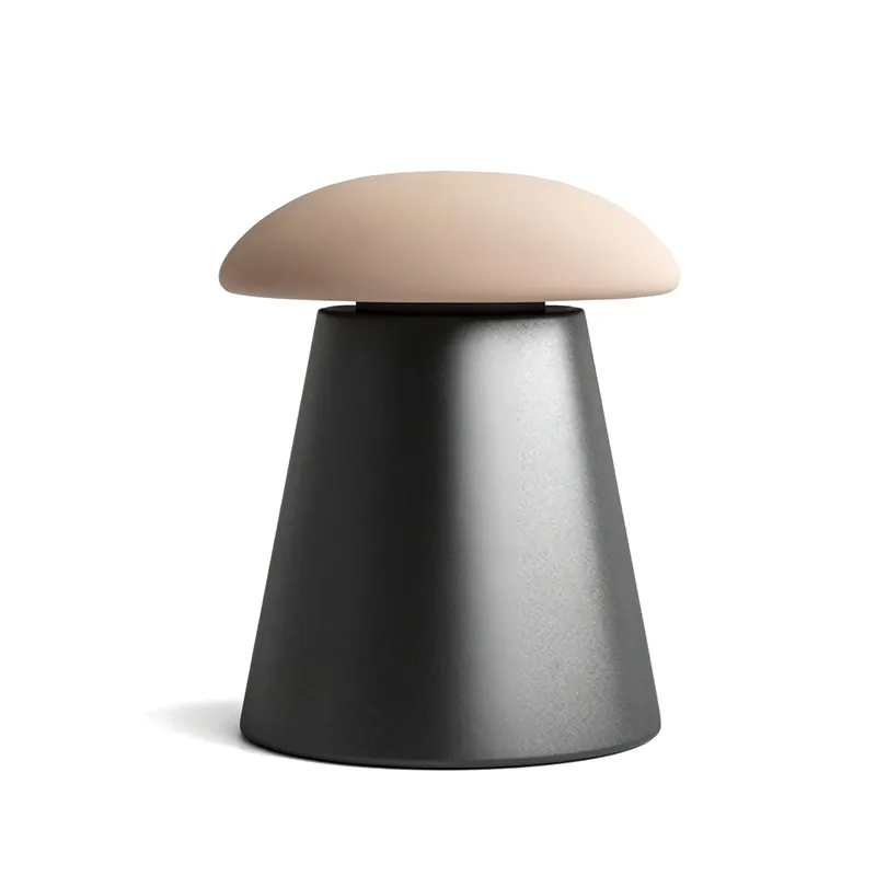 Modern office lounge ottoman with dome-shaped seat and contrasting base