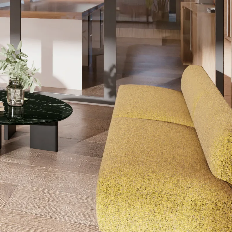 Office breakout area sofa providing flexible seating for informal conversations