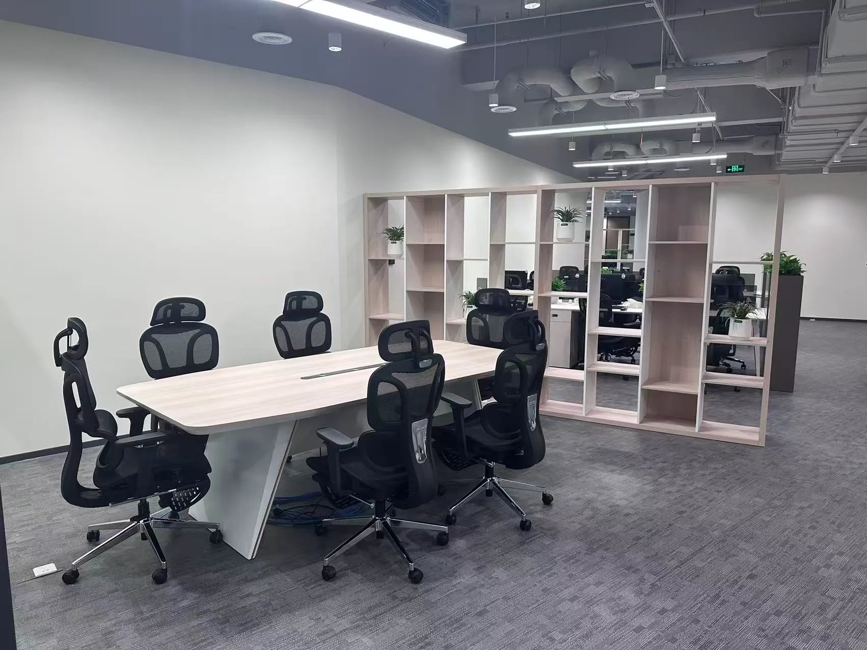 Compact meeting room with modern office furniture