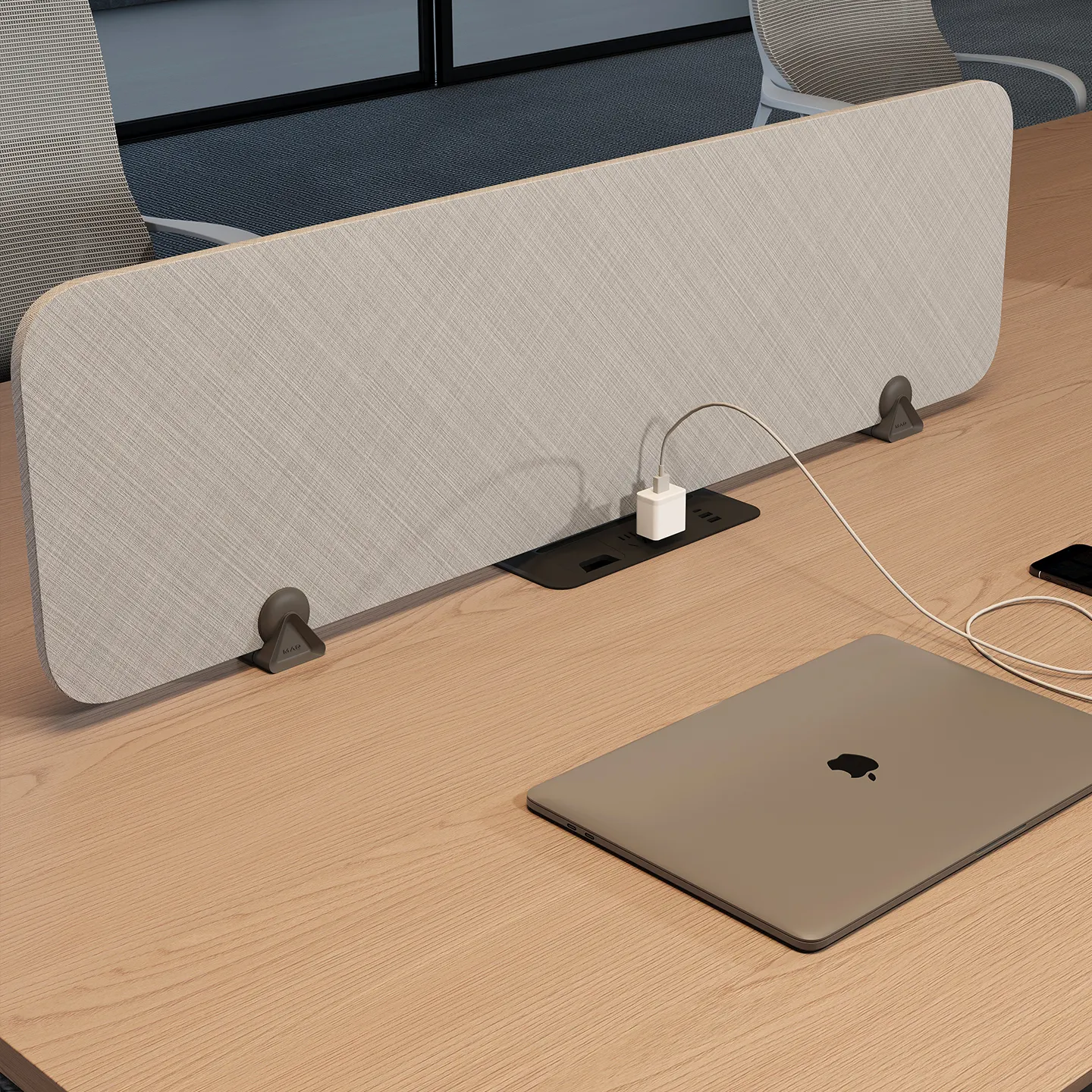 Integrated desktop power outlet for charging devices at office workstation