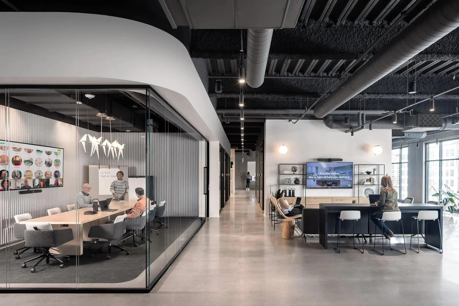 Modern Office Showroom with Glass-Walled Workshop